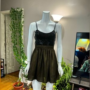 Black sequin bust with dark metallic goldish skirt for prom
